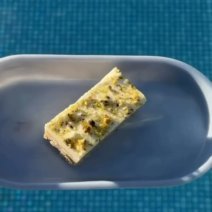 Lemon and pistachio slice on a plate